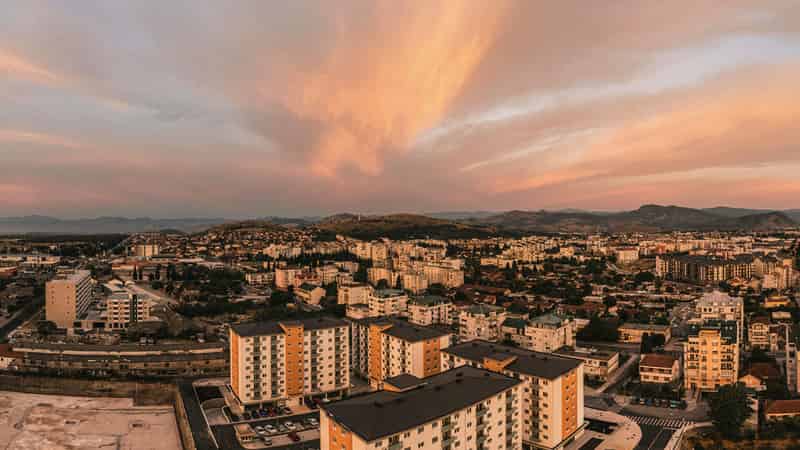 Scenic panoramic aerial view of Podgorica, showcasing the modern architecture and urban landscape of Montenegro's capital.